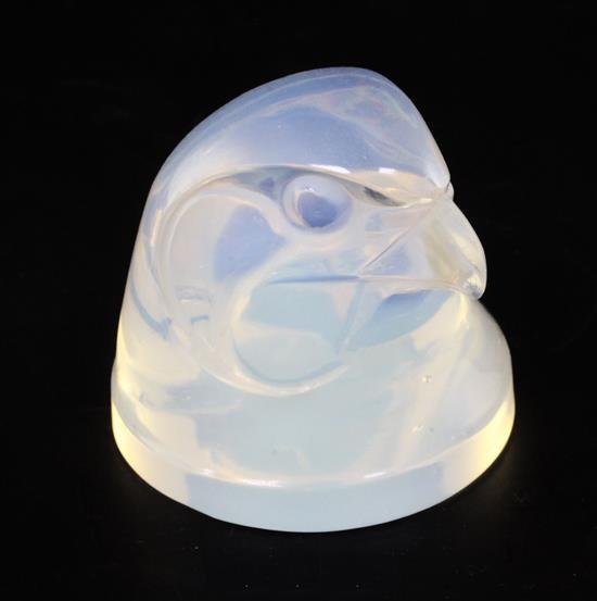 Tête dEpervier/Hawks Head. A glass mascot by René Lalique, introduced on 21/11/1928, No.1139, height 6cm.